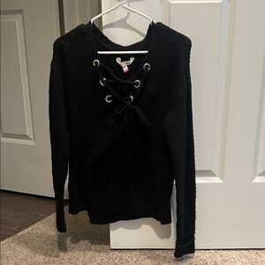 No Boundaries Black Knit Top with Grommet Detail